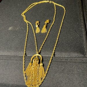 Vintage signed gold tone tassel necklace with matching earrings. A rare find!